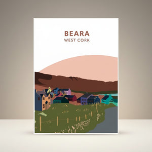 West Cork Folk Beara A4 print featuring a colourful village scene with houses, rolling hills, and a pink sky.
